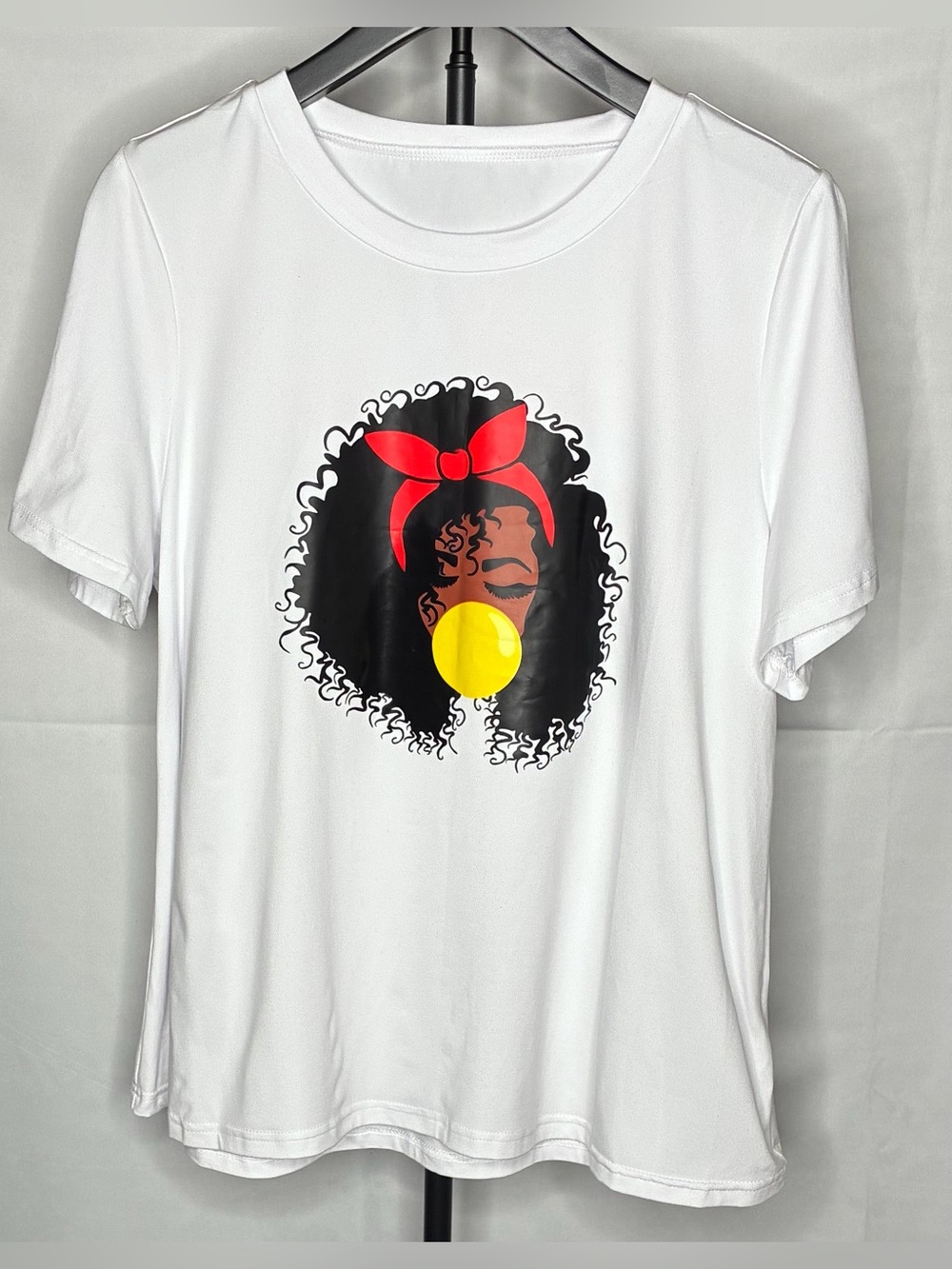 Women’s White Graphic Tee with Red Headband and Yellow Accent